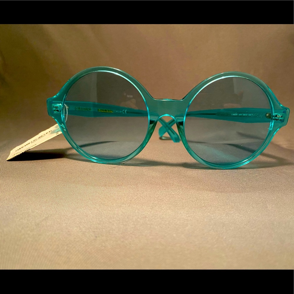 CELINE
Turquoise Acetate Oversized Round Sunglasses- CL400511